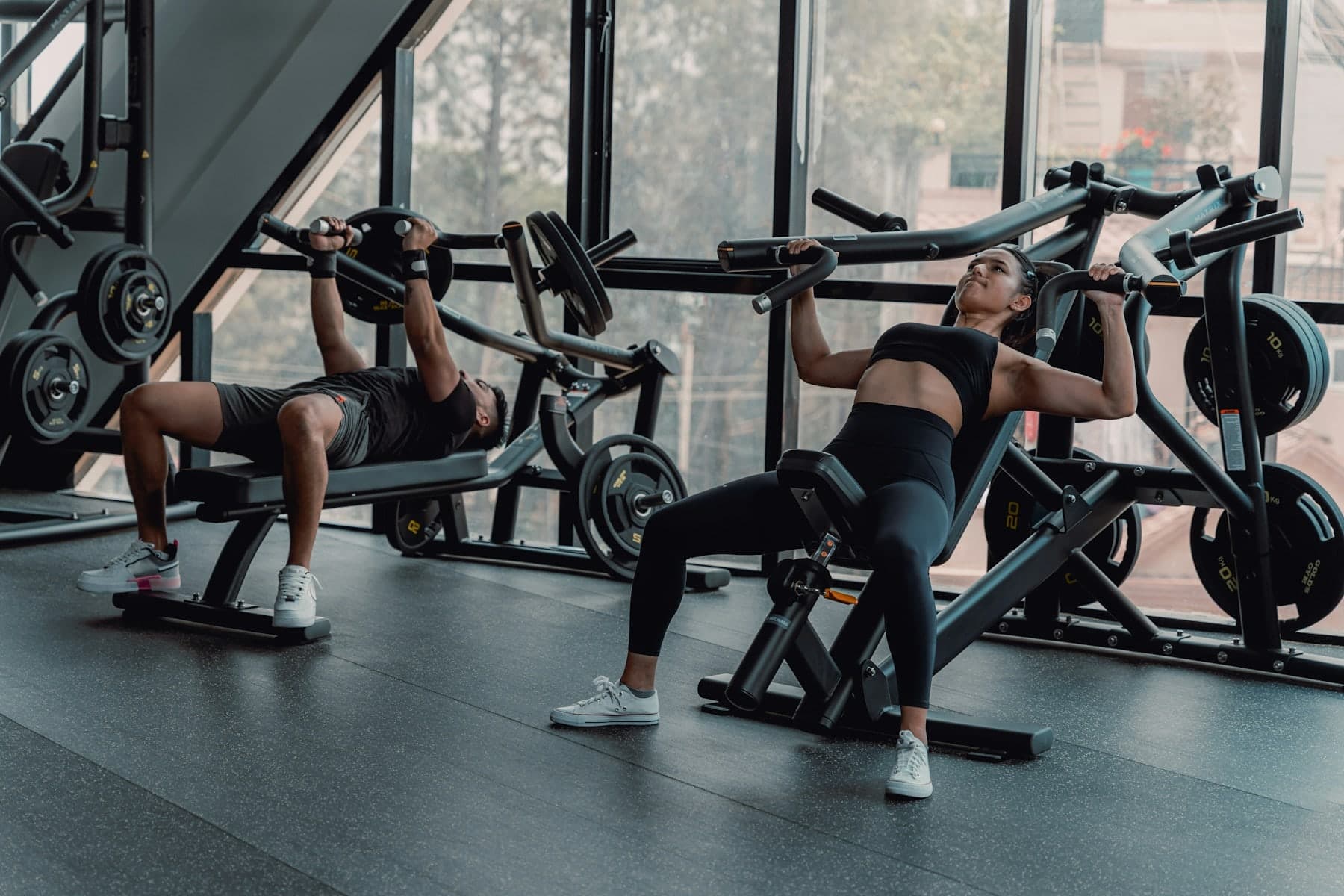 Gym members training together